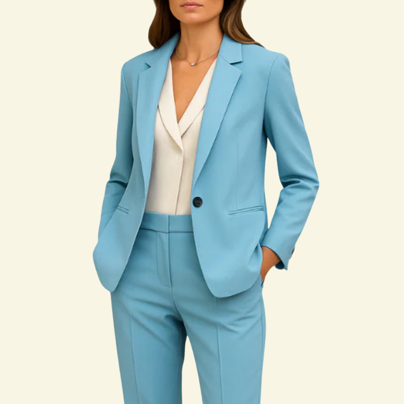 Woman wearingsky blue suit set with white undershirt