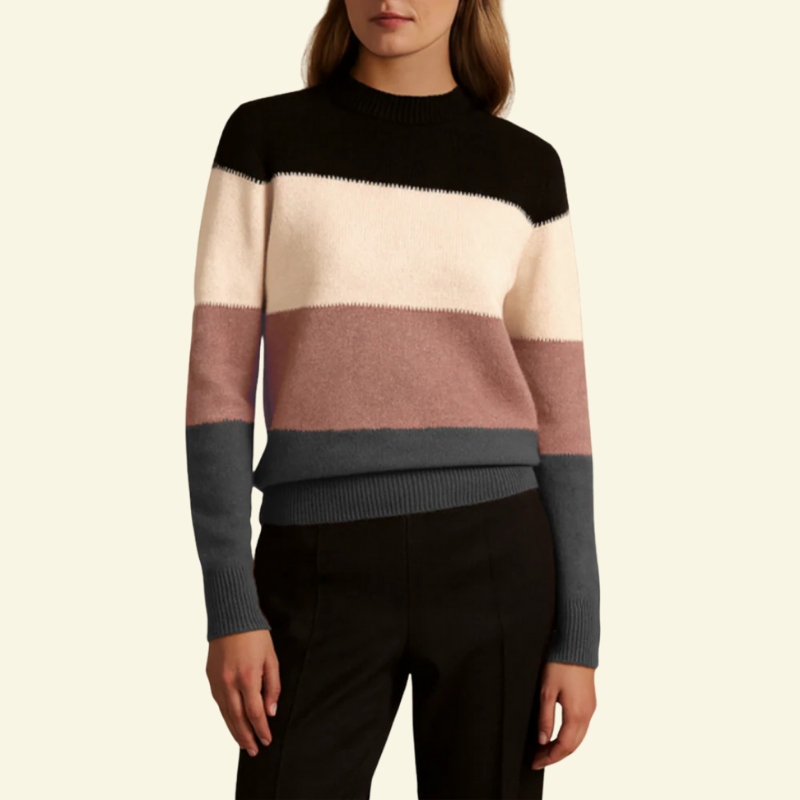 Sweter damski color-block z półgolfem w odcieniach czerni, kremu, pudrowego różu i szarości; miękka, ciepła dzianina.