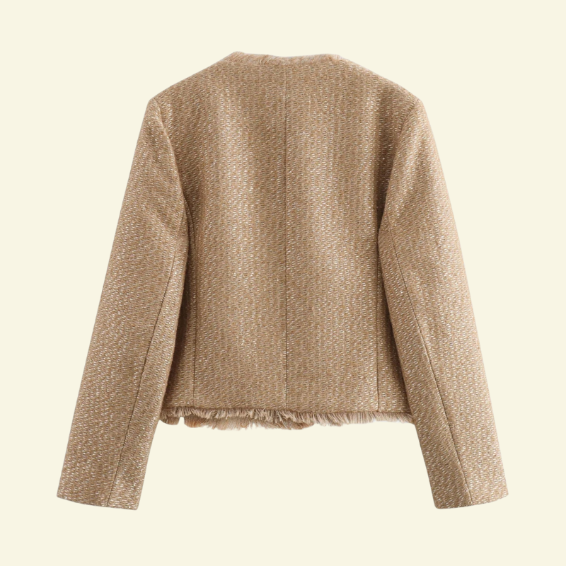 Tył beżowej marynarki tweedowej z frędzlowym wykończeniem — ponadczasowa prostota Lubomirske