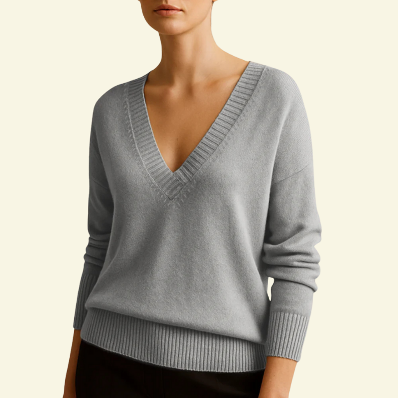 Srebrny sweter damski z dekoltem w serek i eleganckim wykończeniem — Lubomirske