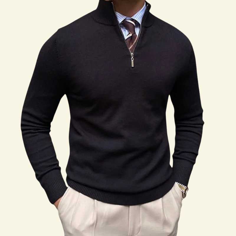 Model w czarnym swetrze rozpinanym z półgolfem, eleganckie dopasowanie i minimalistyczne wykończenie.