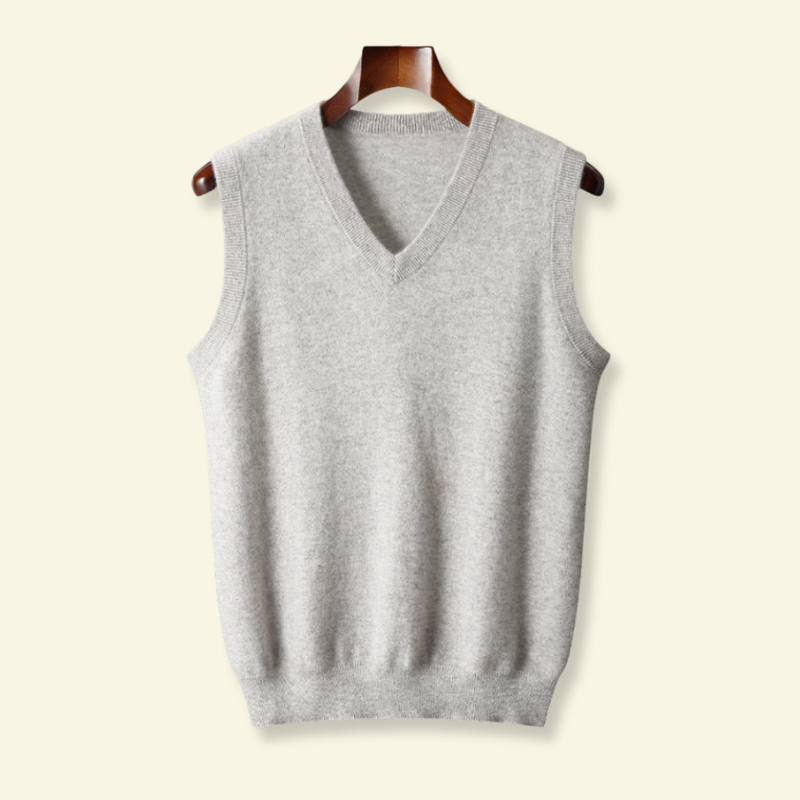 Silver Wool sleeveless sweater hanging from a clothes hanger 