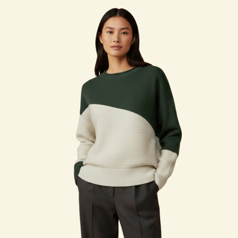 Drugie ujęcie modelki od przodu w swetrze ciemnozielonym, naturalna postawa, widoczne kontrastowe panele.