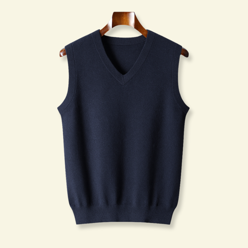 Navy Blue Wool sleeveless sweater hanging from a clothes hanger 