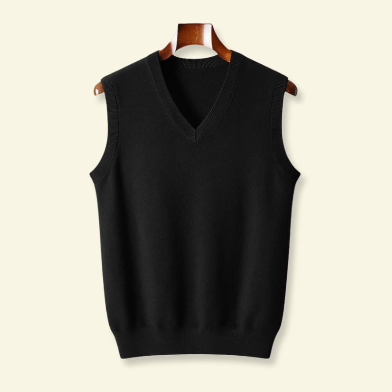 Black Wool sleeveless sweater hanging from a clothes hanger 